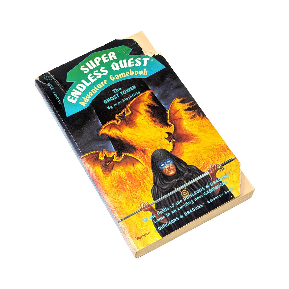 A vintage paperback gamebook titled 'Super Quest: Endless Quest Adventure Gamebook' featuring a fiery fantasy cover illustration with a hooded figure and glowing orange wings, photographed on a plain white background.