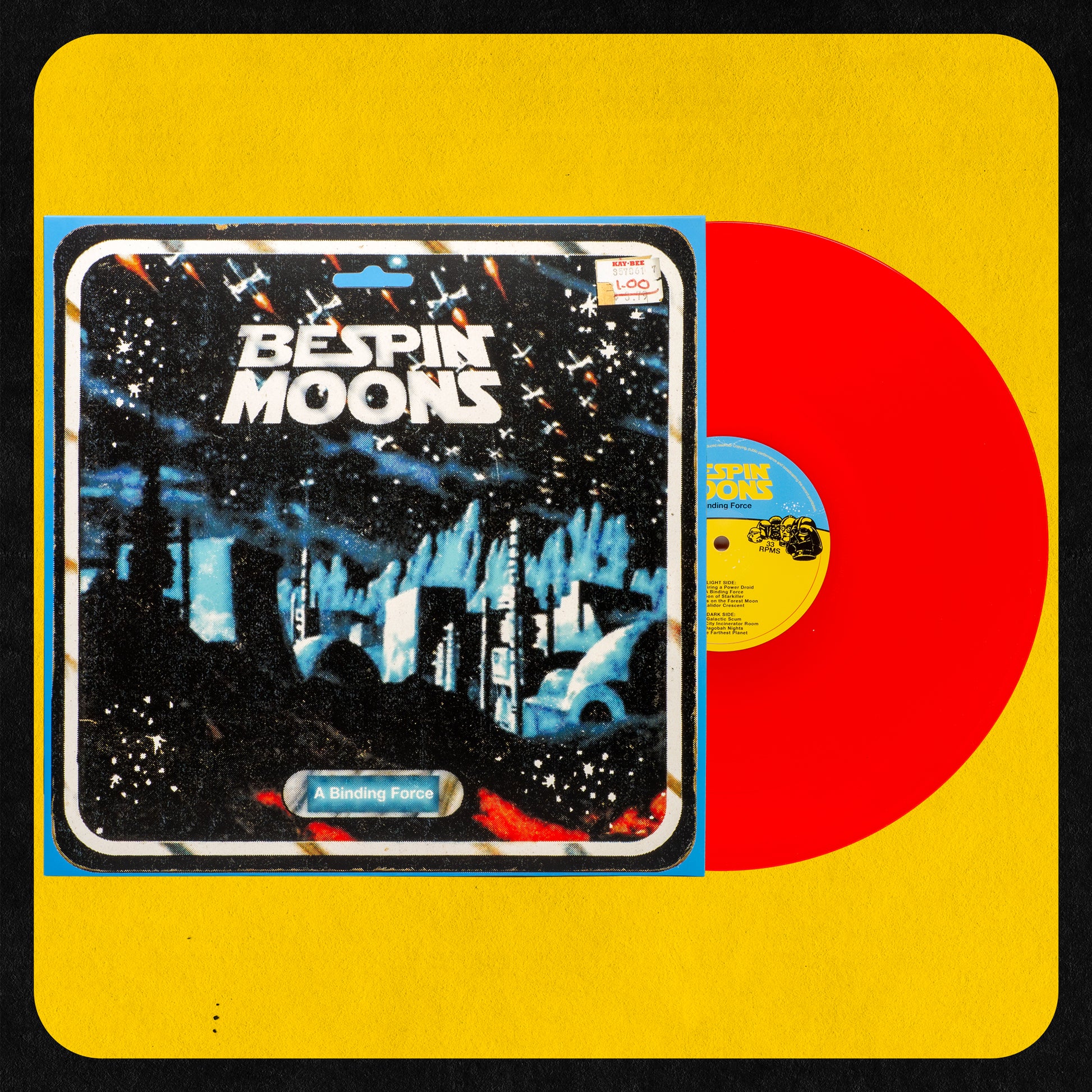 A vinyl record titled 'Bespin Moons A Binding Force' with a stylized cover featuring a star wars theme at night and the album title in bold letters. The record is transparent red.