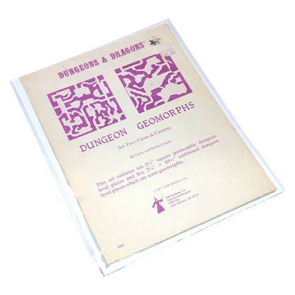 Dungeons & Dragons Dungeon Geomorphs set of two cave and cavern level design dice, shown in a clear plastic sleeve on a white background.
