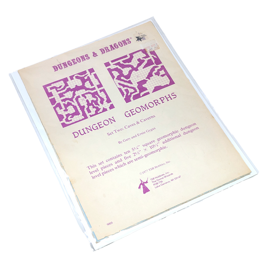 Dungeons & Dragons Dungeon Geomorphs set of two cave and cavern level design dice, shown in a clear plastic sleeve on a white background.