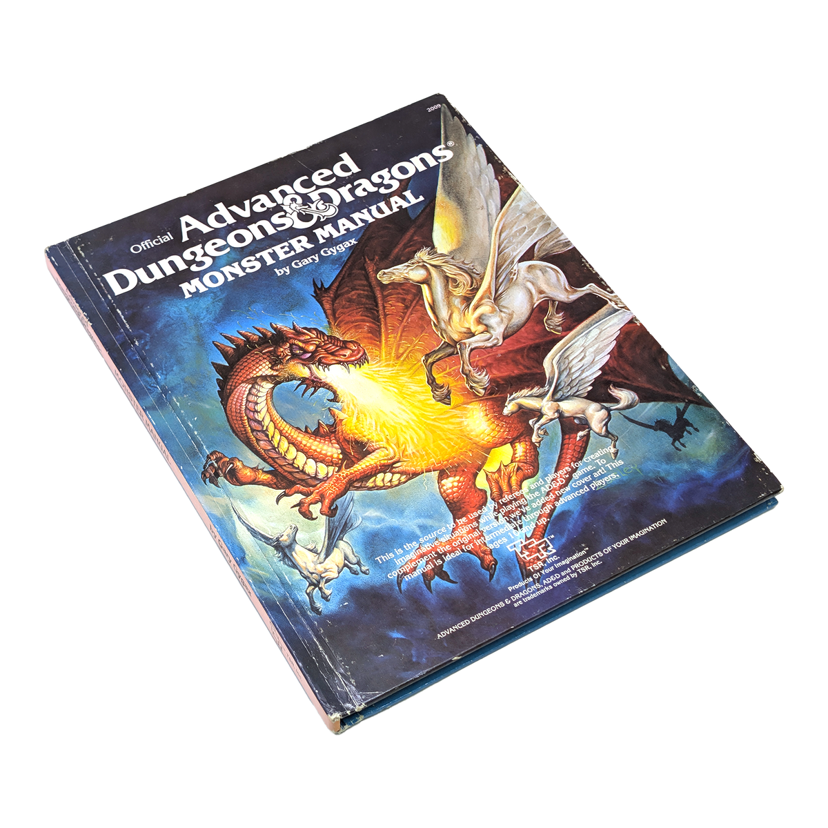 Official Advanced Dungeons Dragons Monster Manual 3rd Edition by Gary Guts, featuring a vibrant cover illustration of a red dragon breathing fire and white winged creatures against a blue background.