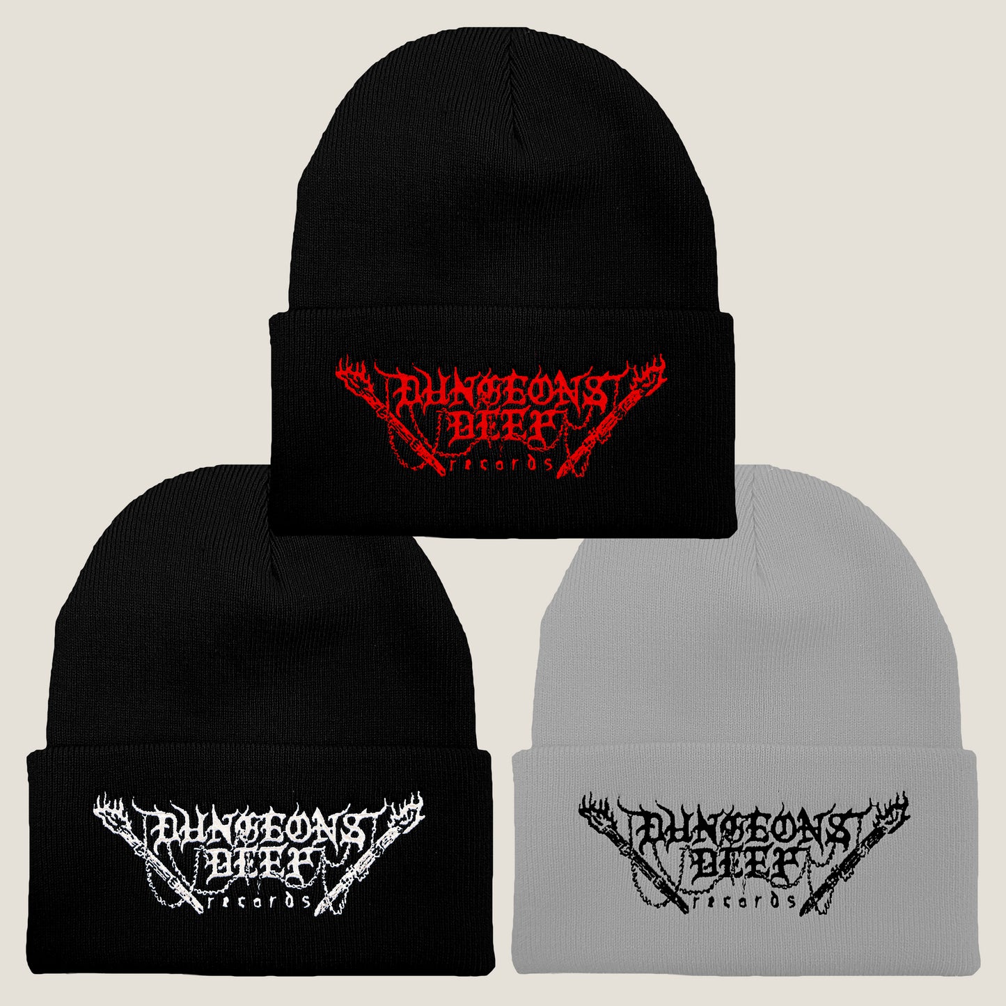 Three Dungeons Deep Records logo beanies in different colors: black with red stitching, gray with black stitching, and black with white stitching, all featuring an embroidered logo on the front.