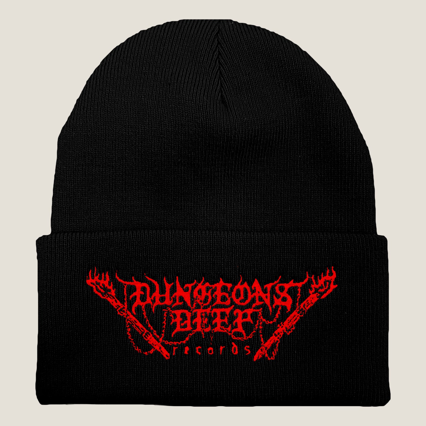 Dungeons Deep Records logo beanie in black with red stitching featuring an embroidered logo on the front.