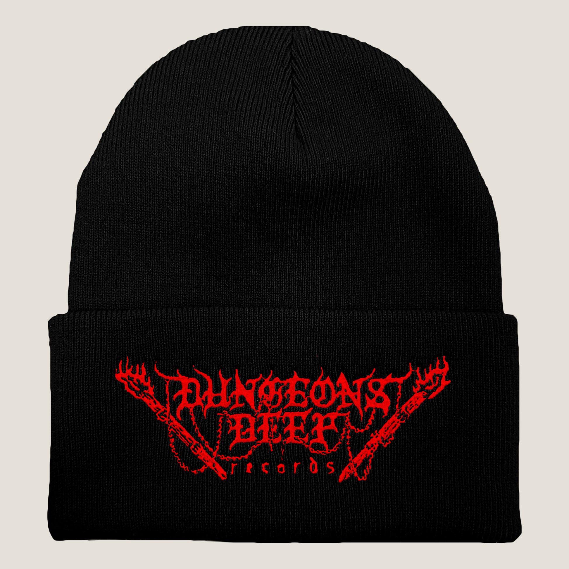 Dungeons Deep Records logo beanie in black with red stitching featuring an embroidered logo on the front.