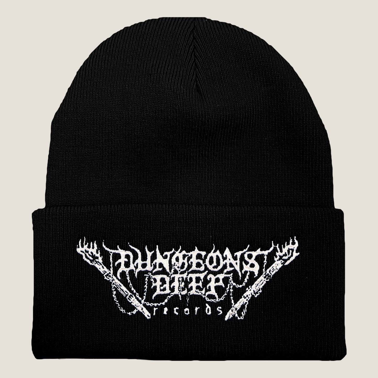 Dungeons Deep Records logo beanie in black with white stitching featuring an embroidered logo on the front.