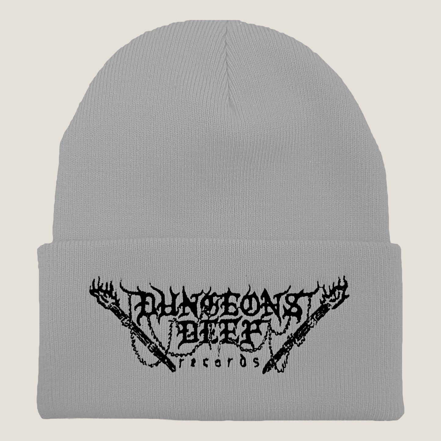 Dungeons Deep Records logo beanie in gray with black stitching featuring an embroidered logo on the front.
