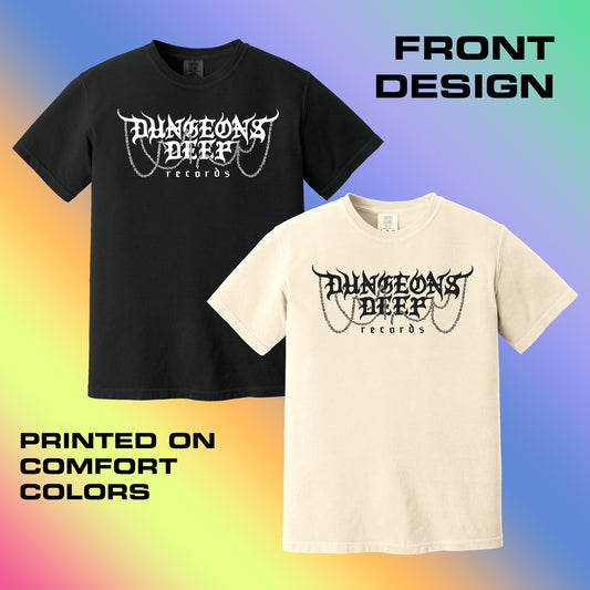 A black and white tshirt featuring the Dungeons Deep Records logo, displaying the Front Design of the T-Shirt and stating that it is printed on Comfort Colors.