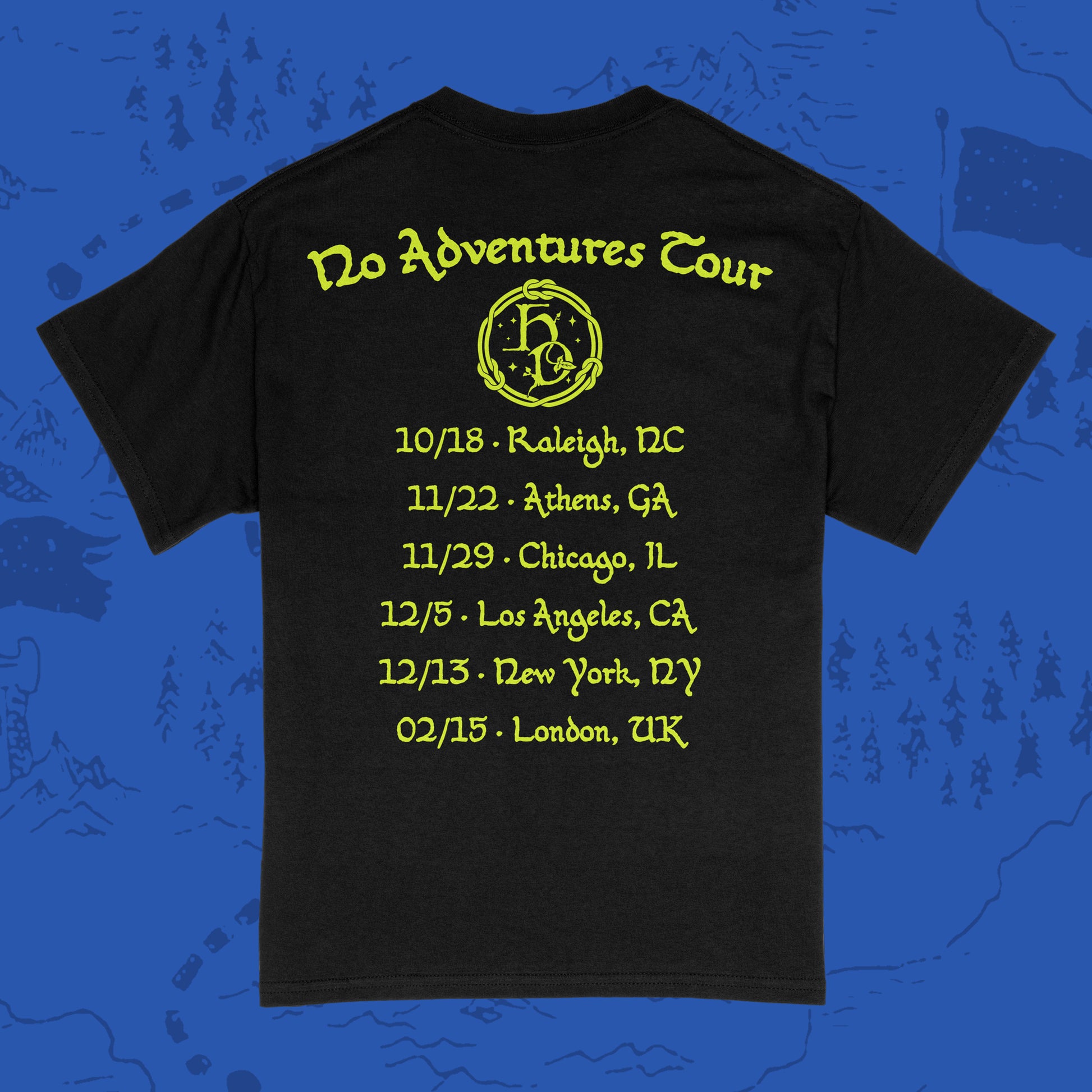 Back of a black short-sleeve Gildan shirt with 'Hole Dweller' 2026 tour dates printed in neon yellow on a blue backdrop.
