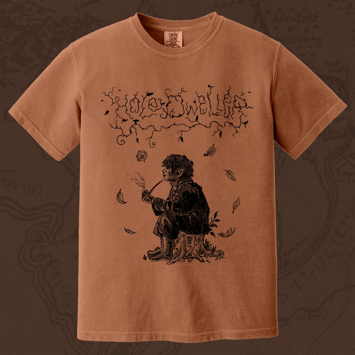 Hole Dweller "flies the coop III" T-Shirt printed in black ink on a dark Orange  shirt. The graphic shows the Hole Dweller logo, and a hobbit sitting on a stump smoking a pipe,