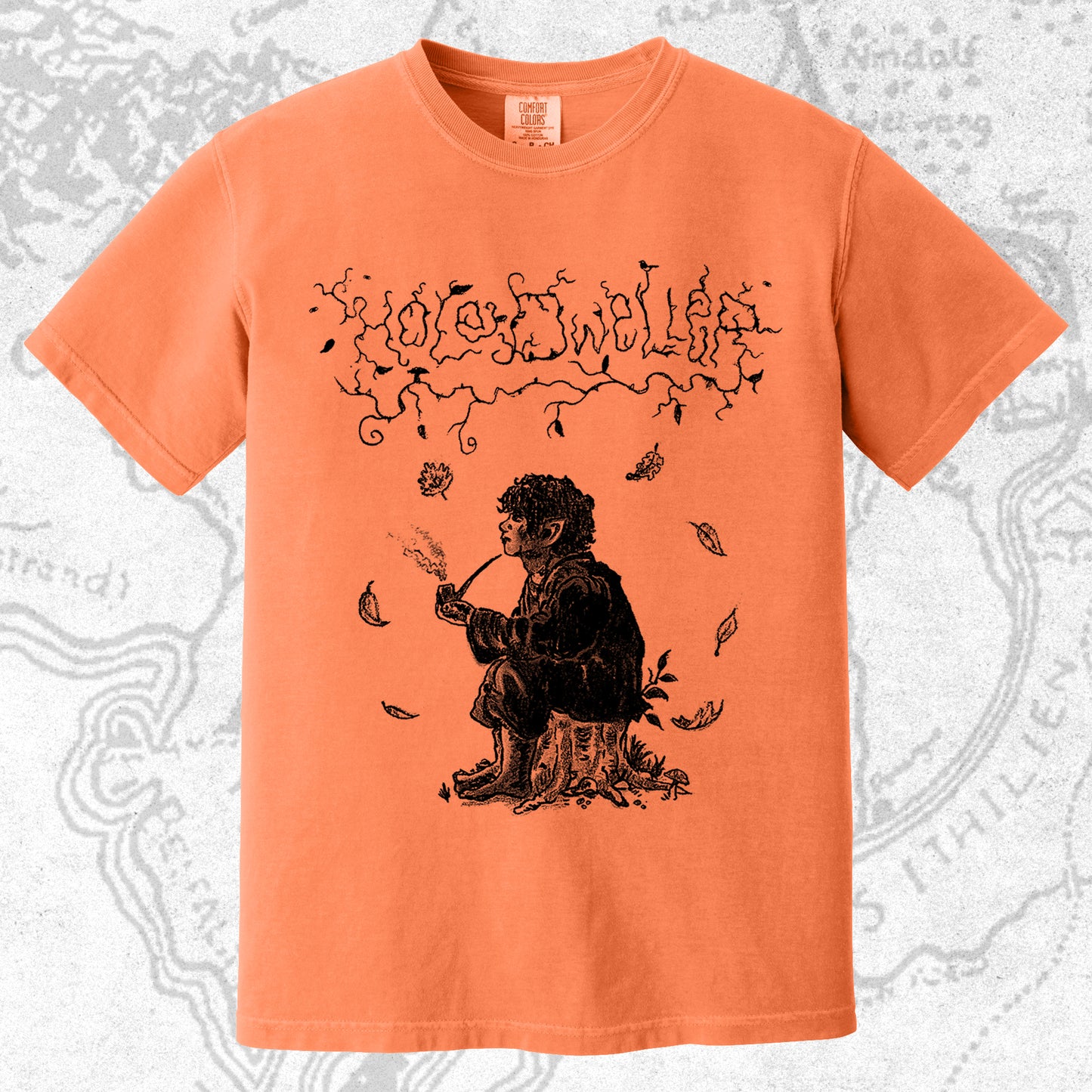 Hole Dweller "flies the coop III" T-Shirt printed in black ink on a light Orange  shirt. The graphic shows the Hole Dweller logo, and a hobbit sitting on a stump smoking a pipe,
