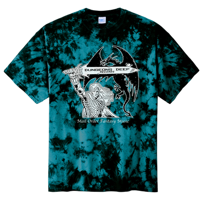 A teal tie dye shirt featuring 'Mail Order Fantasy Music' text and illustrations screen printed on the front. The design depicts a man holding a sword with the words "Dungeons Deep Records" inscribed next to a fantasy dragon.