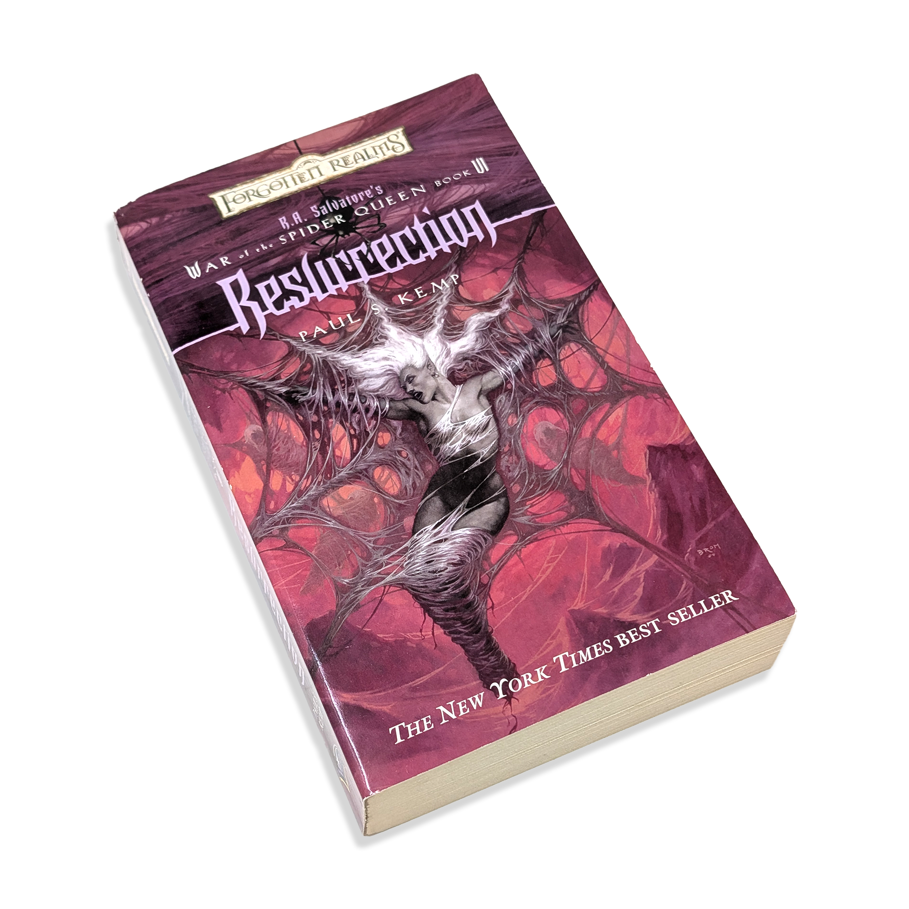 Book titled 'Resurrection' with spider design on a white background
