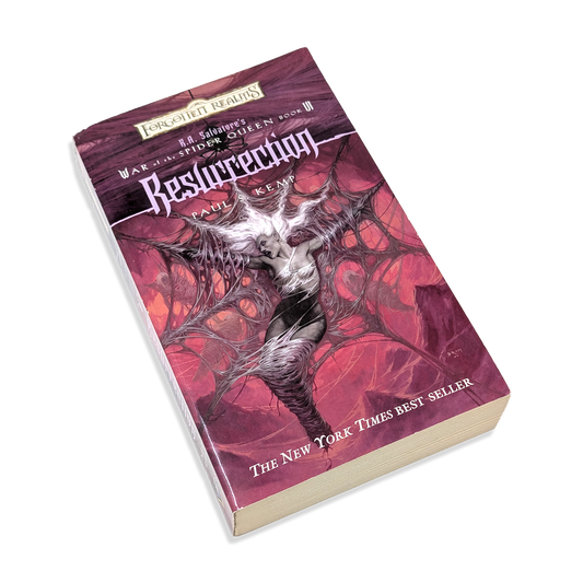 Book titled 'Resurrection' with spider design on a white background