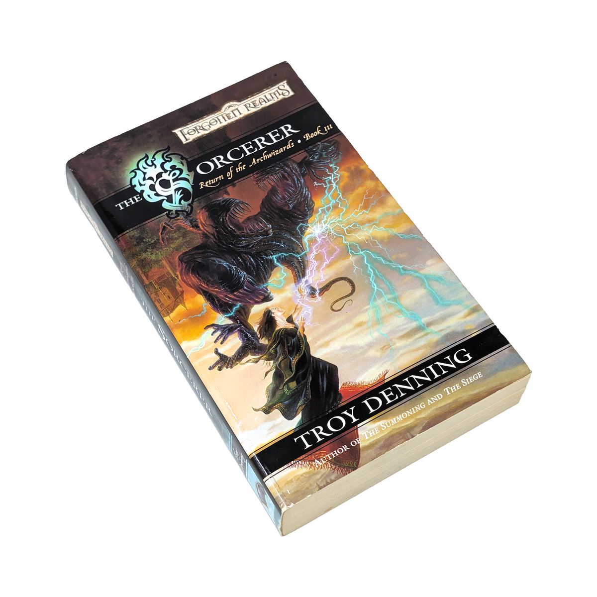 The Forger: Power of the Undead in Battle card game box by Troy Denning, featuring fantasy artwork of a dark undead creature with lightning on a warm orange and yellow background, isolated on a white background.