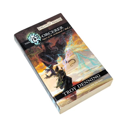 The Forger: Power of the Undead in Battle card game box by Troy Denning, featuring fantasy artwork of a dark undead creature with lightning on a warm orange and yellow background, isolated on a white background.