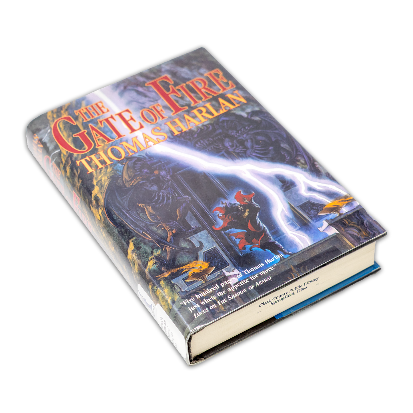Book titled 'The Gate of Fire' by Thomas Harris on a white background