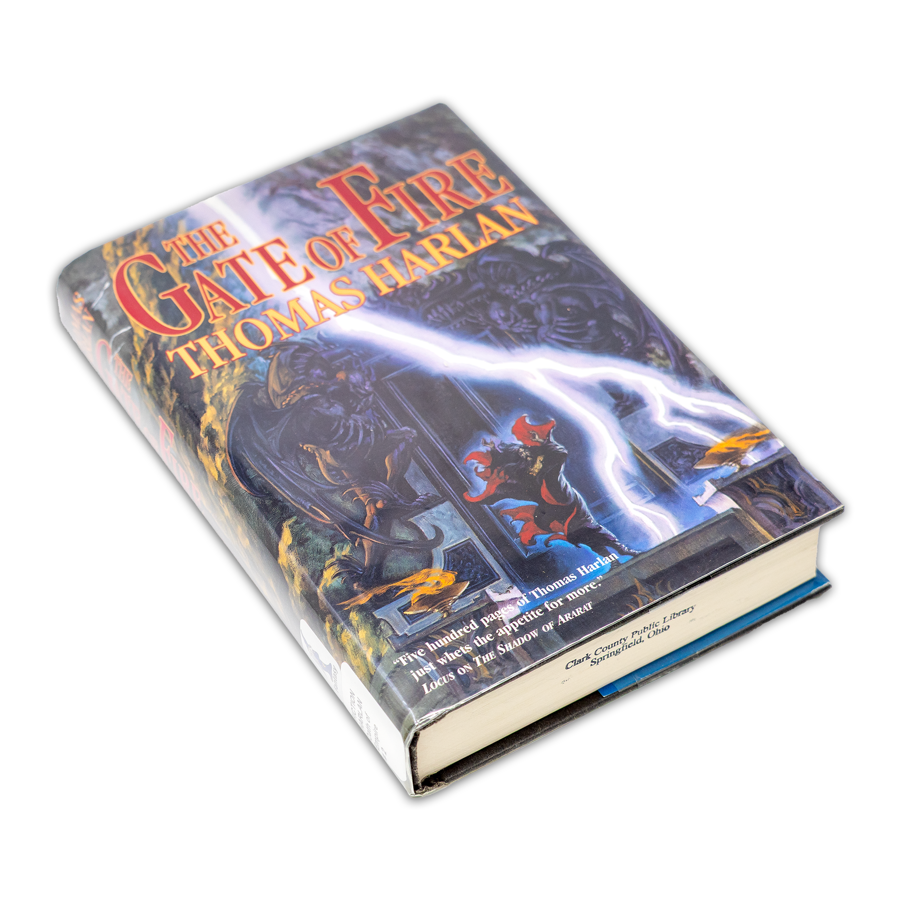 Book titled 'The Gate of Fire' by Thomas Harris on a white background